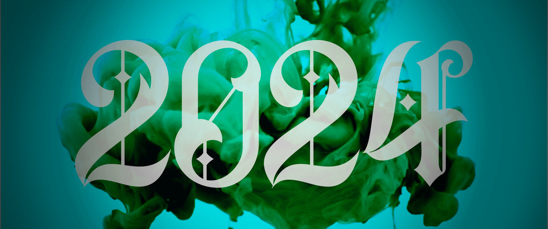 2024 in a fancy font against a blue green background